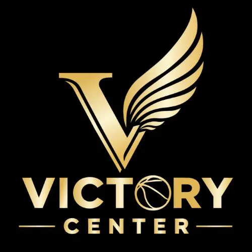 Elegant gold Victory Center logo with a winged V on a black background.
