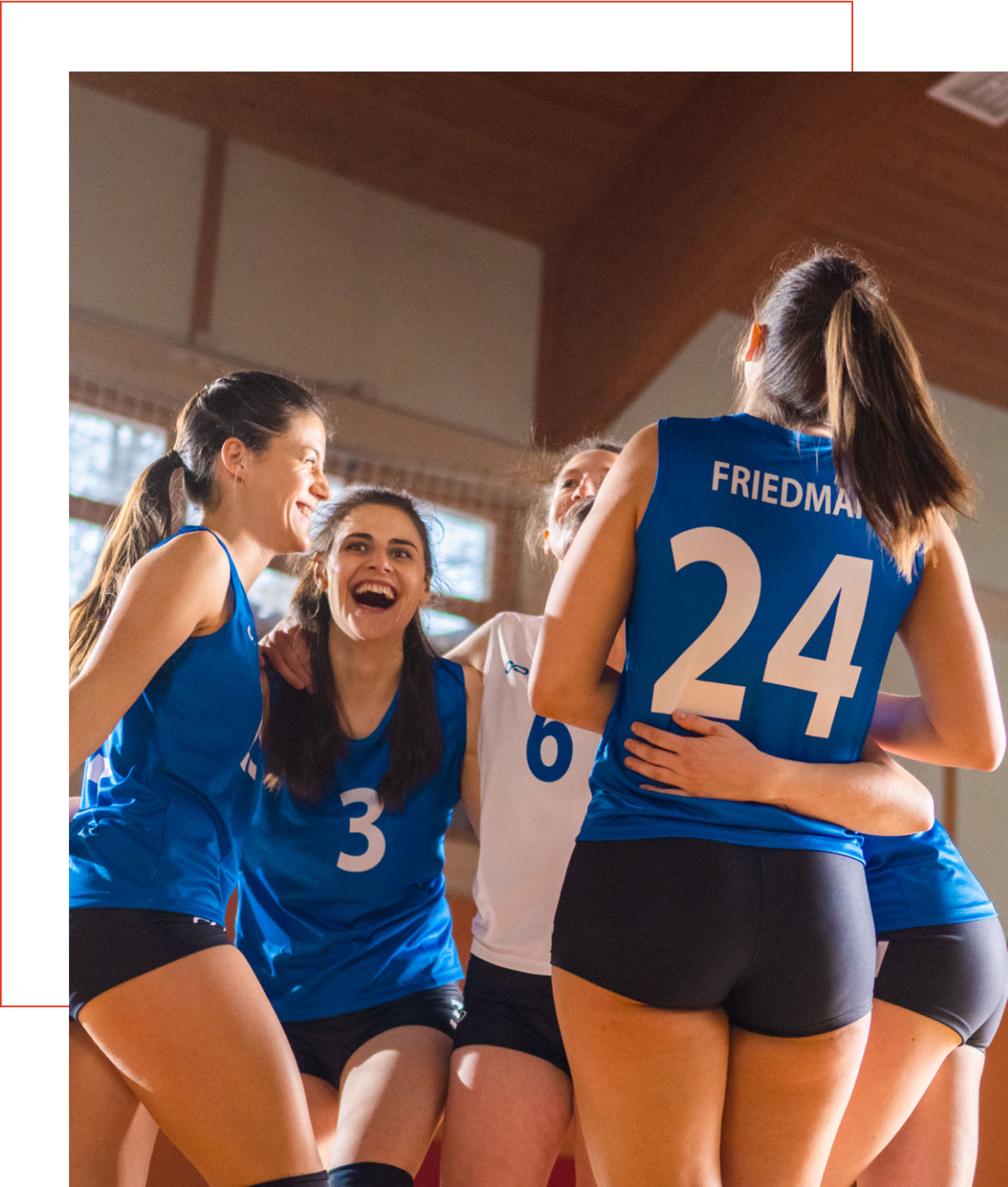 Volleyball team celebrating after a match.